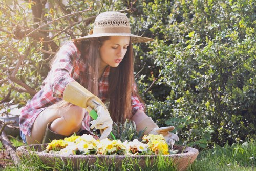 Expert gardener designing a lush London garden